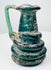 Ancient Roman blown-glass jug with folded rim and decorative raised glass trails