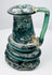 Late Roman glass jug highlighting iridescent weathering, mineral accretions, and hand-blown construction