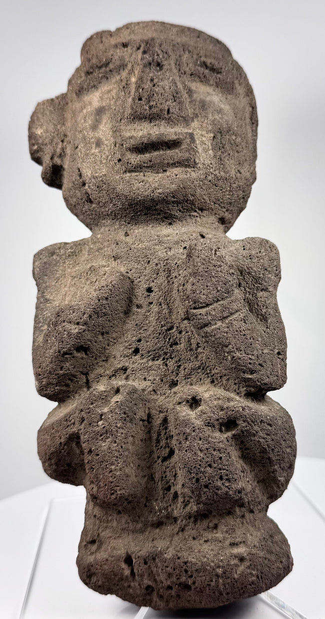 Guerrero Mezcala-style stone figure with monumental head, recessed eyes, and simplified anatomy