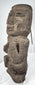 Ancient Mesoamerican stone effigy with oversized rectangular head and weathered porous surface