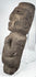 Guerrero stone sculpture depicting an abstract human figure with bent arms and flexed legs