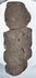 Back view of Pre-Columbian Guerrero stone figure showing flattened reverse and natural volcanic stone texture