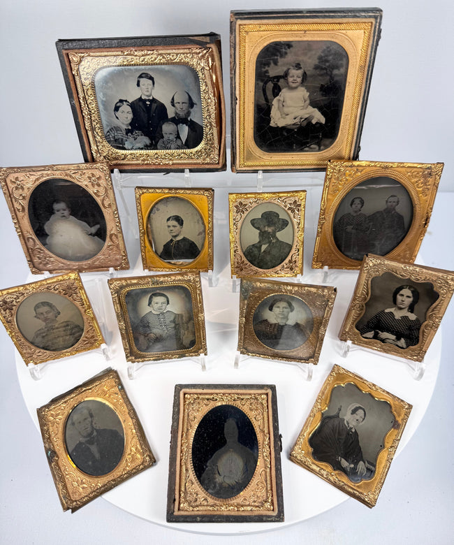 Mid-19th-century American cased photographs arranged together in ornate Victorian portrait frames