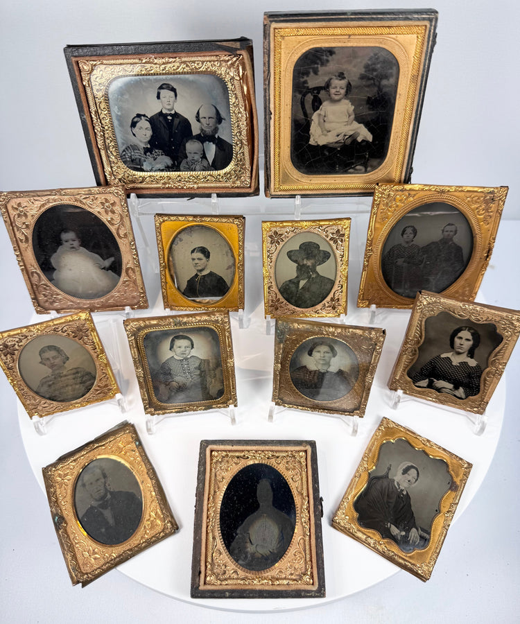 Mid-19th-century American cased photographs arranged together in ornate Victorian portrait frames
