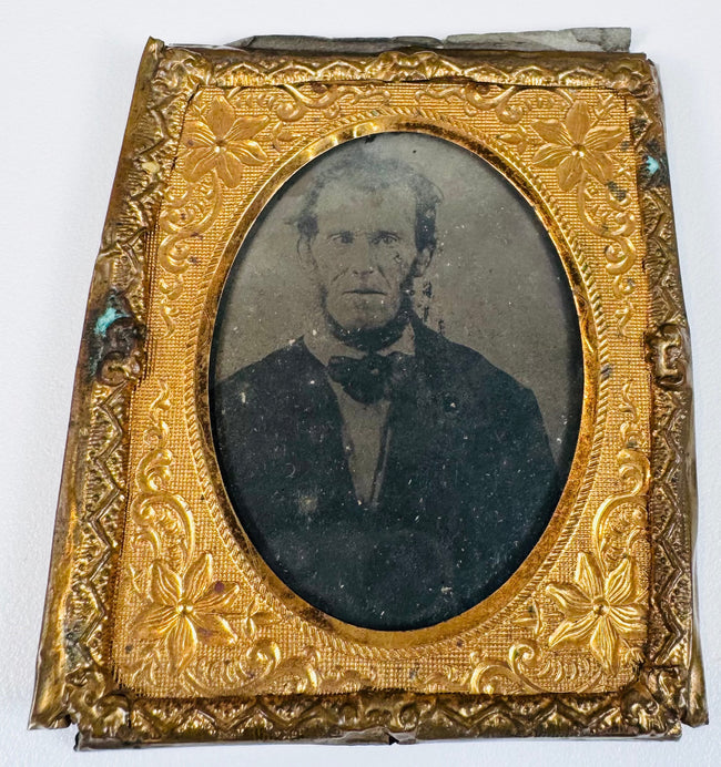 Mid-19th-century family group photograph displayed in a decorative period cased portrait mount