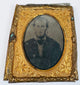 Mid-19th-century family group photograph displayed in a decorative period cased portrait mount