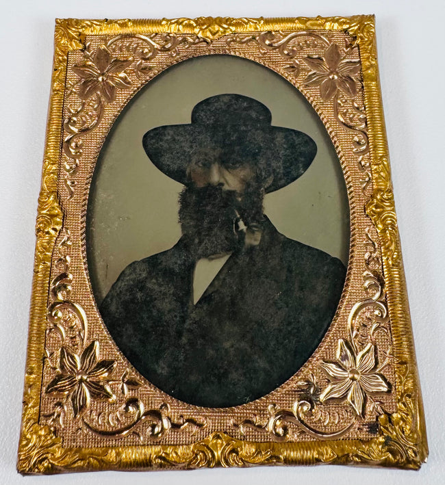 Antique cased portrait of a gentleman in formal Victorian clothing with ornate gilt-brass surround
