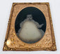 Mid-19th-century cased portrait of a young child wearing patterned period clothing