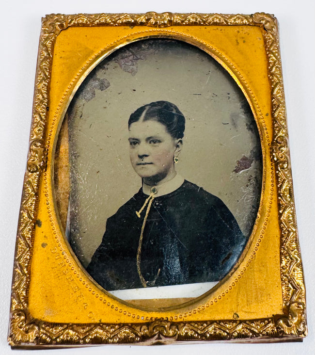 Victorian cased portrait of a young gentleman in formal attire with an oval gilt decorative mat