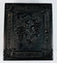 Ornately molded thermoplastic Union case with grapevine, floral, and scroll decoration