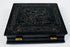 Mid-19th-century thermoplastic photographic case with ornate molded relief decoration and brass hinges