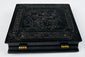 Mid-19th-century thermoplastic photographic case with ornate molded relief decoration and brass hinges