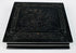 Closed Victorian Union case showing raised molded floral and geometric decoration on dark thermoplastic exterior
