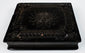 Closed antique photographic Union case showing dark molded exterior, decorative border, and period hardware