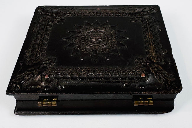 Mid-19th-century molded Union case highlighting detailed relief decoration and original protective construction