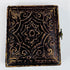 Decorative mid-19th-century photographic case with embossed scrolling and foliate exterior design