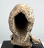 Open reverse of ancient Greek terracotta protome showing original hollow backless construction