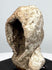 Ancient terracotta protome revealing deep concave interior and mold-made hollow construction