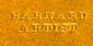 Close-up of impressed “E. RENARD / ARTISTE” maker or photographer marking associated with the ambrotype