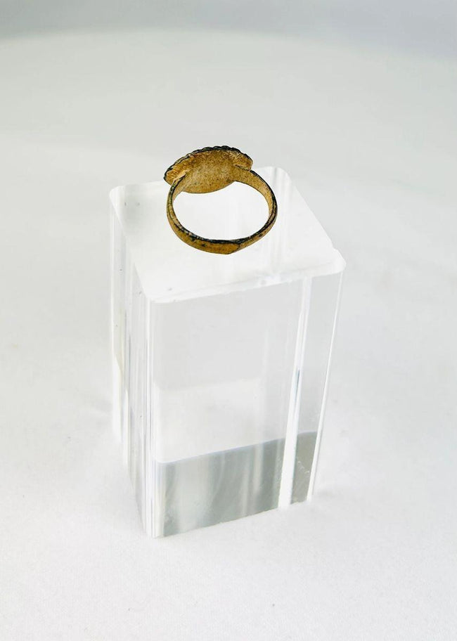Authentic Roman bronze ring displaying mineralized surface and natural patination