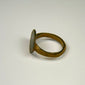 Ancient Roman finger ring displaying incised vertical lines across the bezel and centuries-old green patina