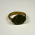 Ancient Roman bronze jewelry with oval signet-style bezel, green patination, and age-related surface wear
