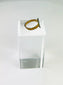 Roman bronze ring artifact photographed to show texture and incised decoration