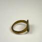 Ancient Roman signet ring with raised oval bezel and preserved vertical engraved detailing