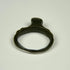 Ancient Roman jewelry ring with flat bezel, subtle surface oxidation, and preserved cast construction