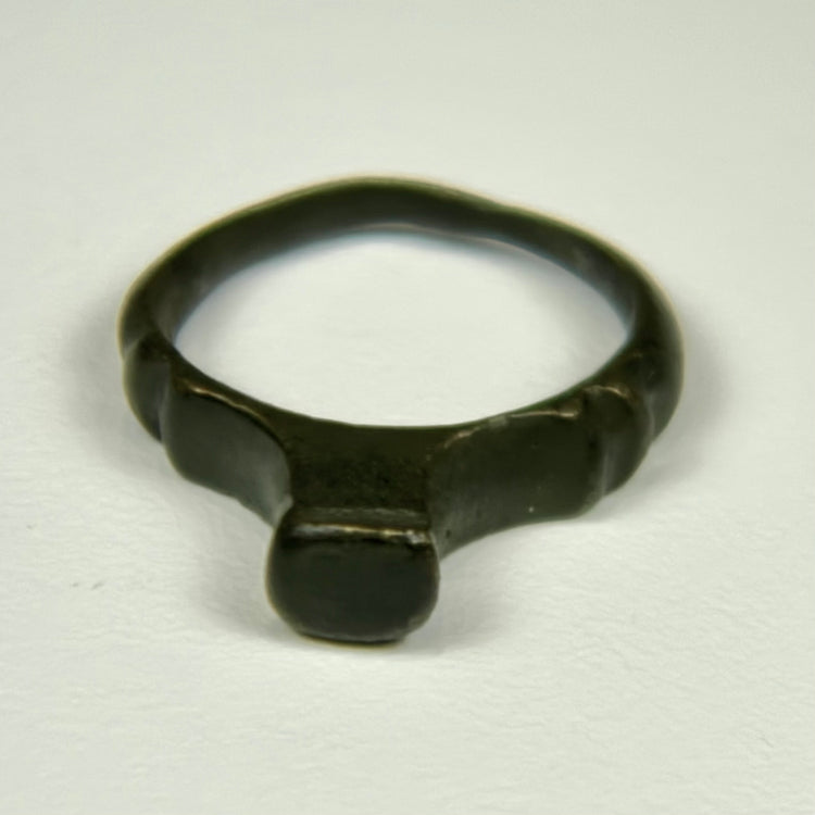 Imperial Roman signet ring with unrestored bronze surface and age-related oxidation throughout