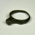Ancient Roman finger ring with broad bezel, compact band, and preserved archaeological character