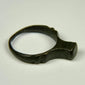 Roman period bronze finger ring featuring a wide flat bezel and centuries-old surface wear