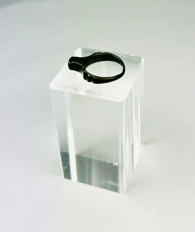 Side view of an ancient Imperial Roman bronze ring displaying classical proportions