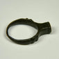 Ancient bronze signet ring from the Roman Empire with weathered bezel and light mineral deposits