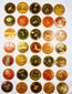 Group of antique Indian Ganjifa round playing cards featuring vibrant hand-painted mythological and courtly scenes, arranged neatly on a white backdrop.
