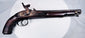 Nineteenth-century Afghan frontier pistol with weathered hardwood stock and original metal fittings