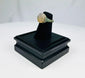 Antique ring featuring bearded male bust in profile on garnet gemstone