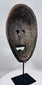 Antique carved wood mask from Fatuleu Village with projecting muzzle, circular eyes, and traditional tribal design.