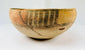 Indus Valley bowls with natural earthen patina and painted geometric motifs
