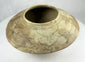 Ancient Harappan terracotta bowl showing stylized fish imagery and slip-painted decoration.