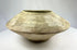 Archaeological terracotta bowl from the Indus Valley with preserved painted decoration.