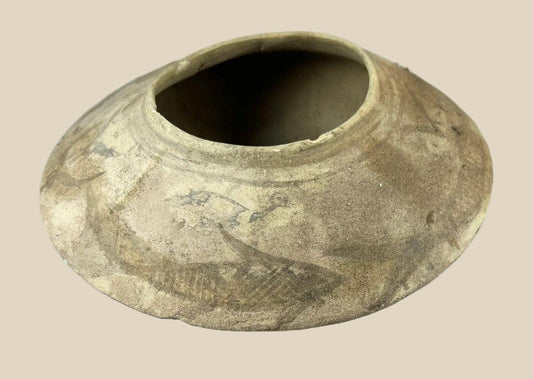 Ancient Indus Valley terracotta bowl, 2nd millennium BCE, decorated with painted fish motifs. Rare prehistoric ceramic with geometric and aquatic designs, reflecting early riverine culture and symbolism in South Asian civilization.
