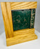 19th century rim lock with skeleton key mounted on wooden display stand