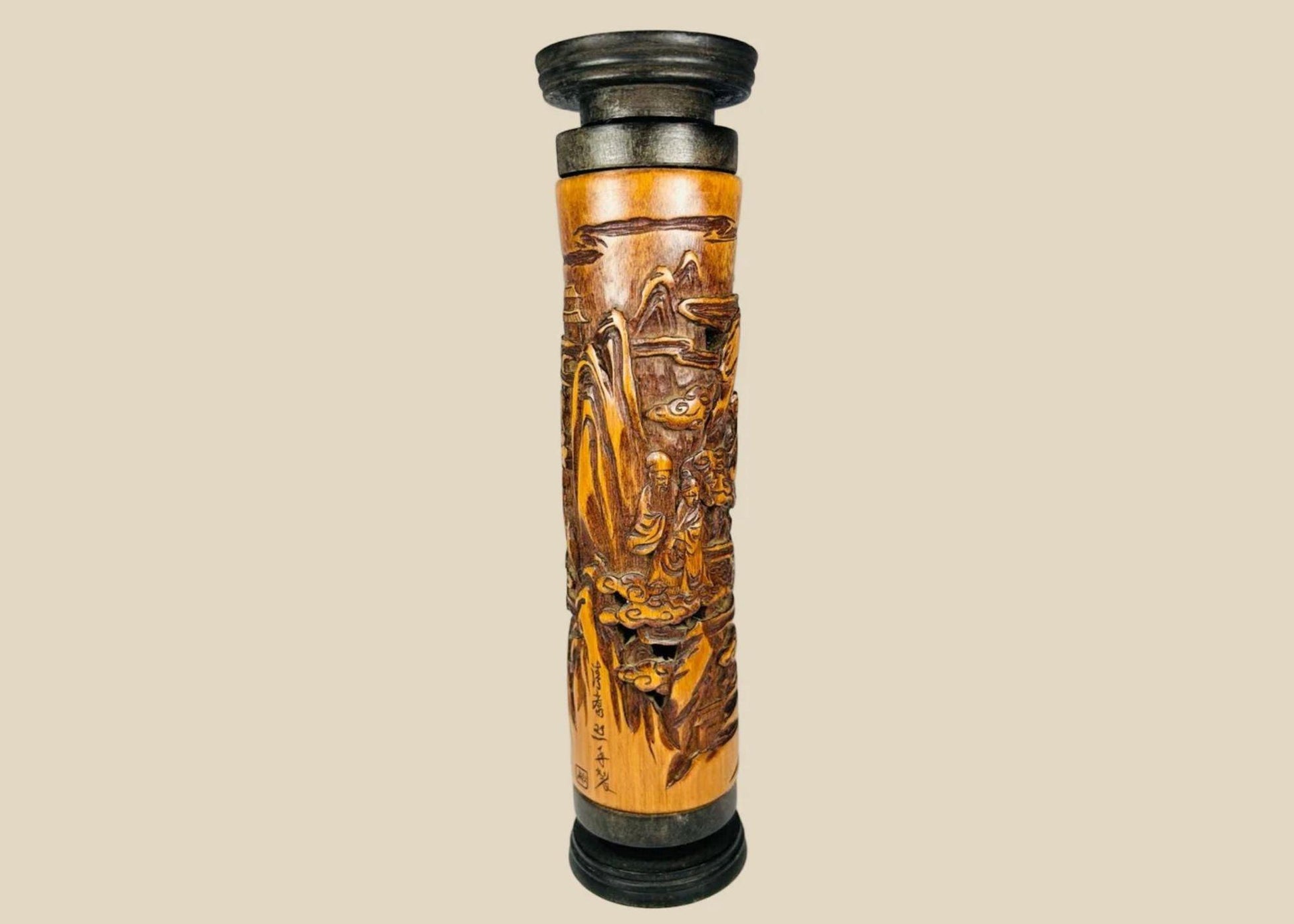 Late 19th-century Chinese boxwood incense holder, intricately hand-carved with detailed landscape and figure scenes, cylindrical form with dark-stained end caps; showcases fine Qing-era craftsmanship in wood carving for ritual and domestic use.