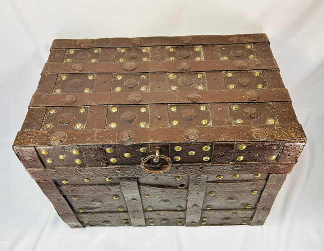 1840-dated Iberian strongbox in Renaissance style with heavy iron construction, brass studs, and robust security design