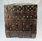 Renaissance-style iron strongbox with brass inscription plaque, raised front compartment, and historic European craftsmanship