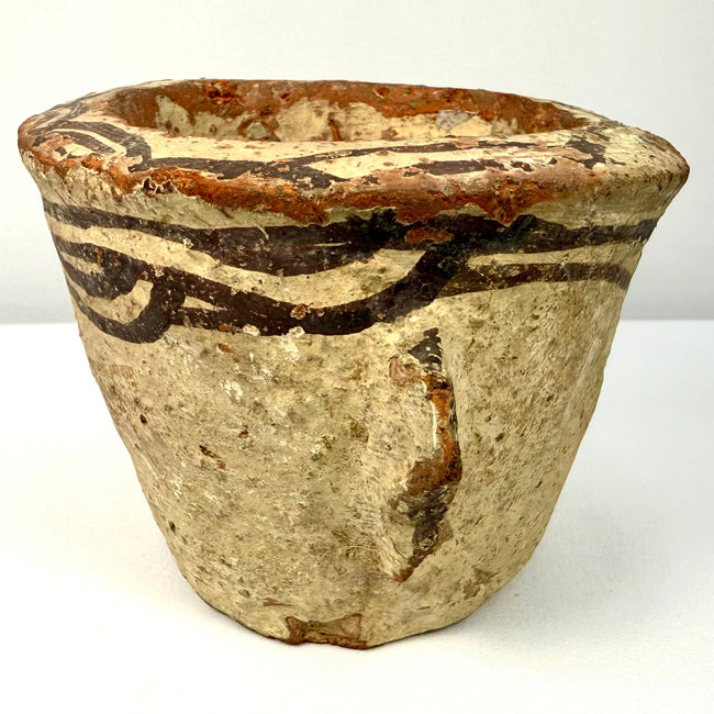 12th Century Islamic terracotta mortar with wavy slip decoration