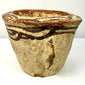 12th Century Islamic terracotta mortar with wavy slip decoration