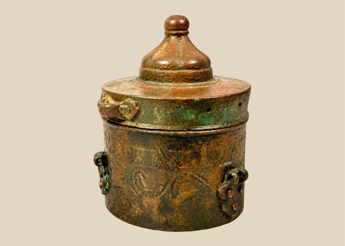 Islamic Khorassan bronze inkwell with domed lid and engraved floral geometric motifs