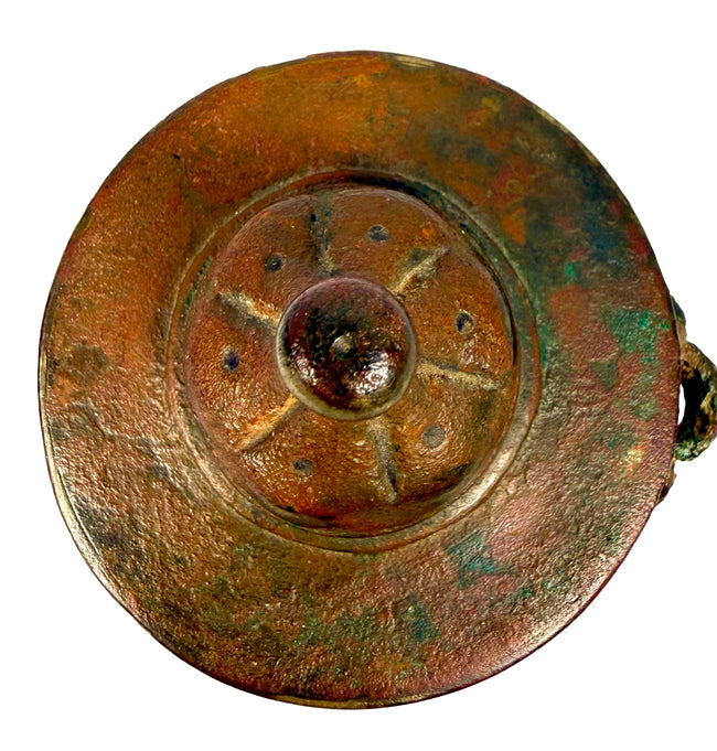 Medieval Khorassan bronze inkwell showcasing a rounded lid finial, aged bronze patina, surface pitting, and intricate ornamental decoration.